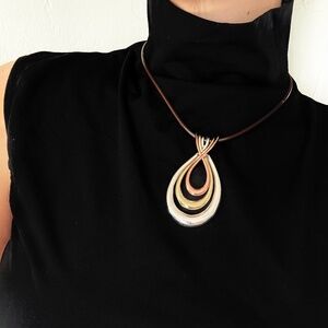 Brown necklace with steel